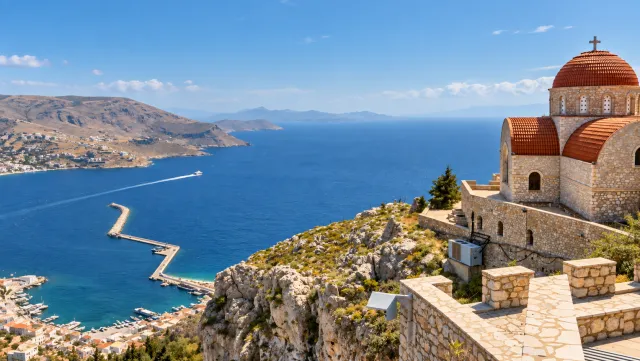 Agios Savvas monastery above Pothia harbor on nearby Kalymnos, Greece