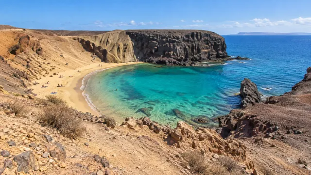 Playa de Papagayo cove on Lanzarote in clear daylight