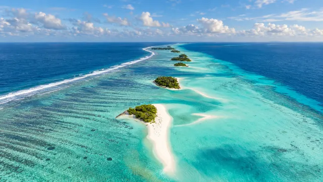 Island chain, reef and sandbars in Thaa Atoll, Maldives
