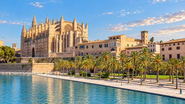 Cathedral of Mallorca above the Parc de la Mar lake in warm Mediterranean light