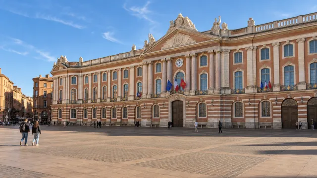 The Capitole's pink brick and stone façade in Place du Capitole